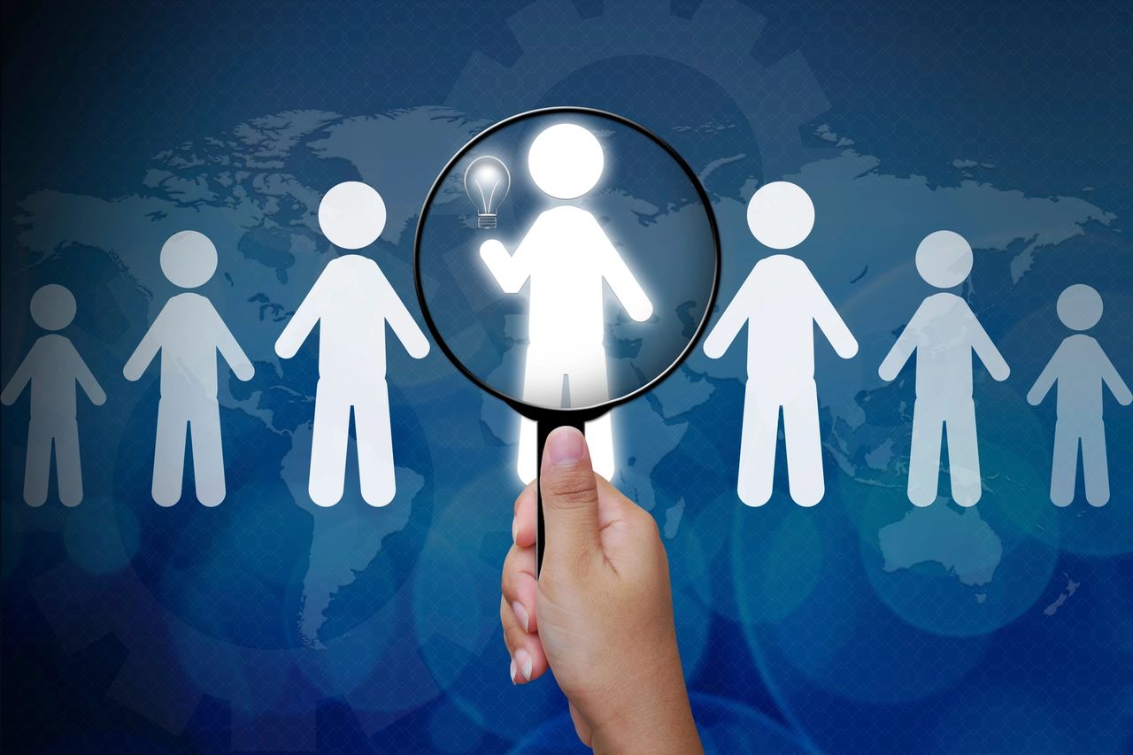 magnifying glass focusing on a person
